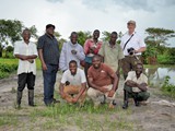 Group photo at the ponds of the community in Mjinchi